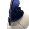 Navy velvet teardrop percher with beautiful feather detail.